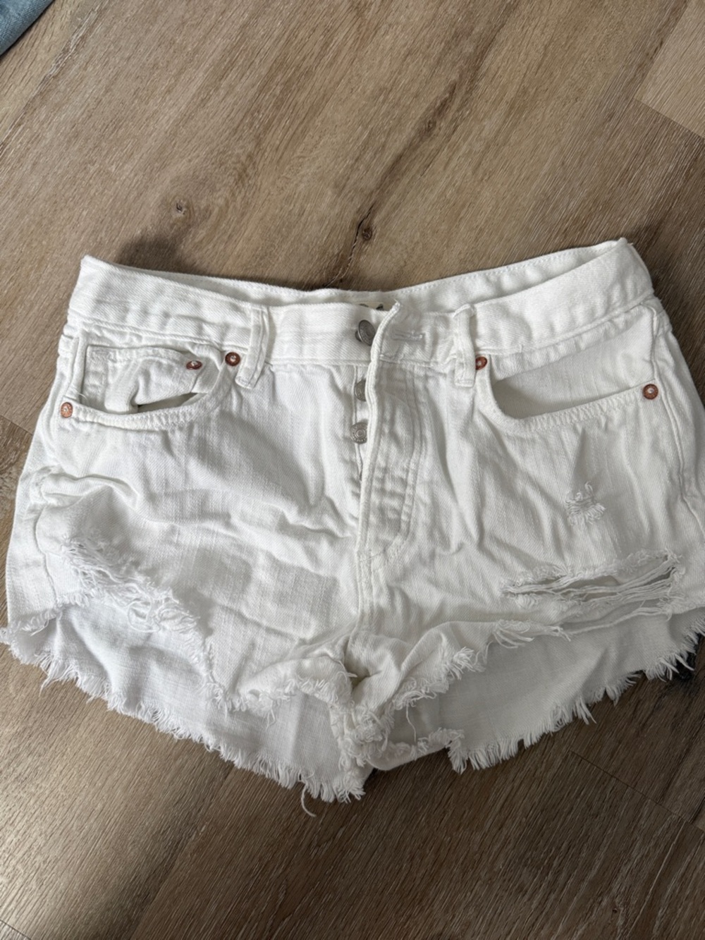 We The Free White Distressed Denim Cutoff Shorts
